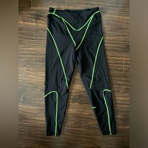 SKIMS Black Leggings with Green Accents